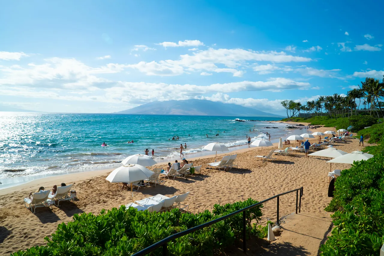 Beach umbrellas on the Maui coast near South Maui resort areas